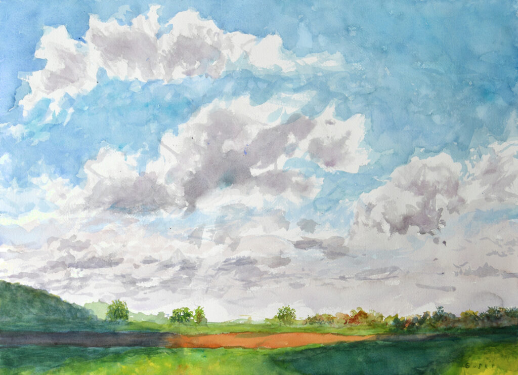 Original watercolor wall art, a country landscape painting in blues, greens, and browns, fluffy clouds, sunny sky, shadows on the land